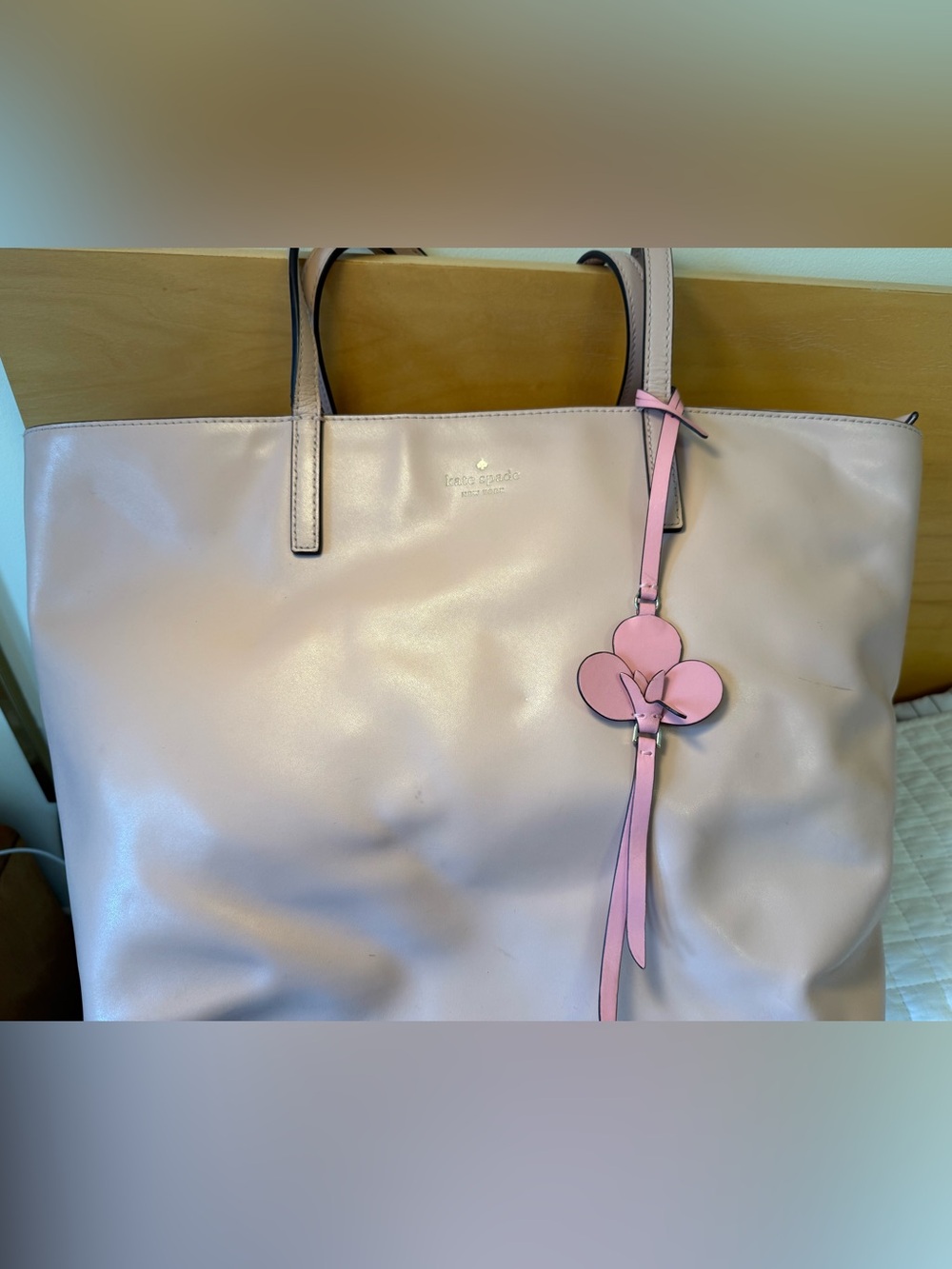 kate spade blush pink leather tote with floral charm